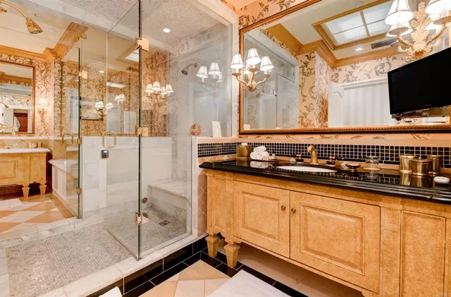 a bathroom with a sink a mirror and a bathtub