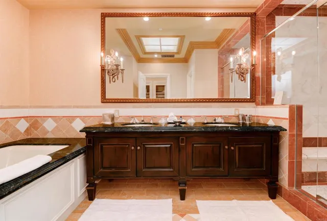 a view of a double sink and a stove