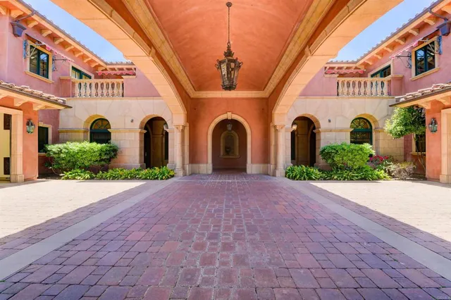 a front view of a building with garden