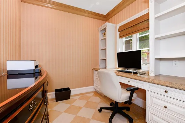 a view of a workspace with furniture