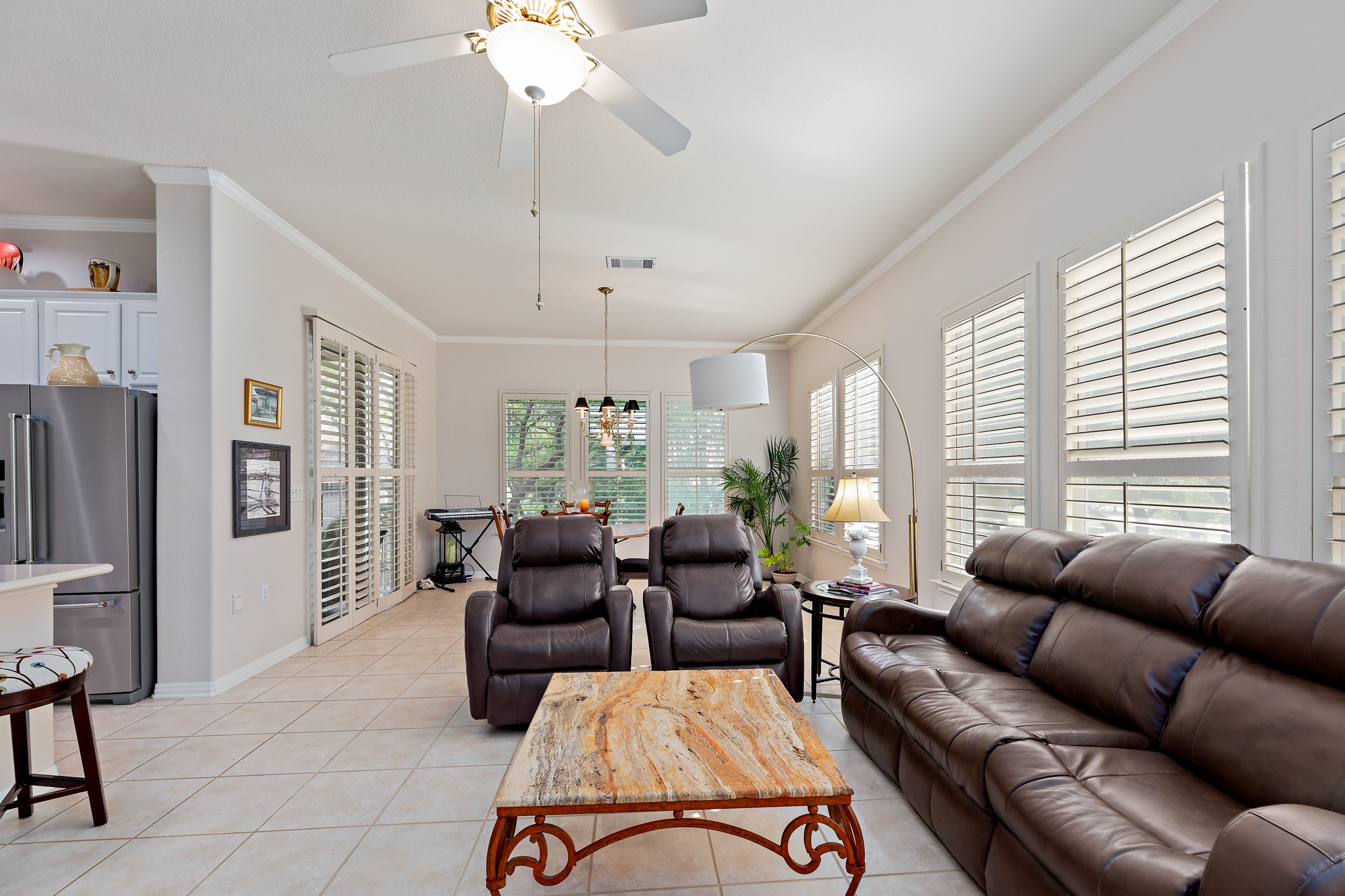 106 Wild Turkey Lane Georgetown, TX 78633 - Photo 15 of 39 a living room with furniture ceiling fan and a window