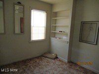 3526 Radcliffe Road Cleveland Heights, OH 44121 - Photo 10 of 10 Empty room with plenty of natural light and built in features