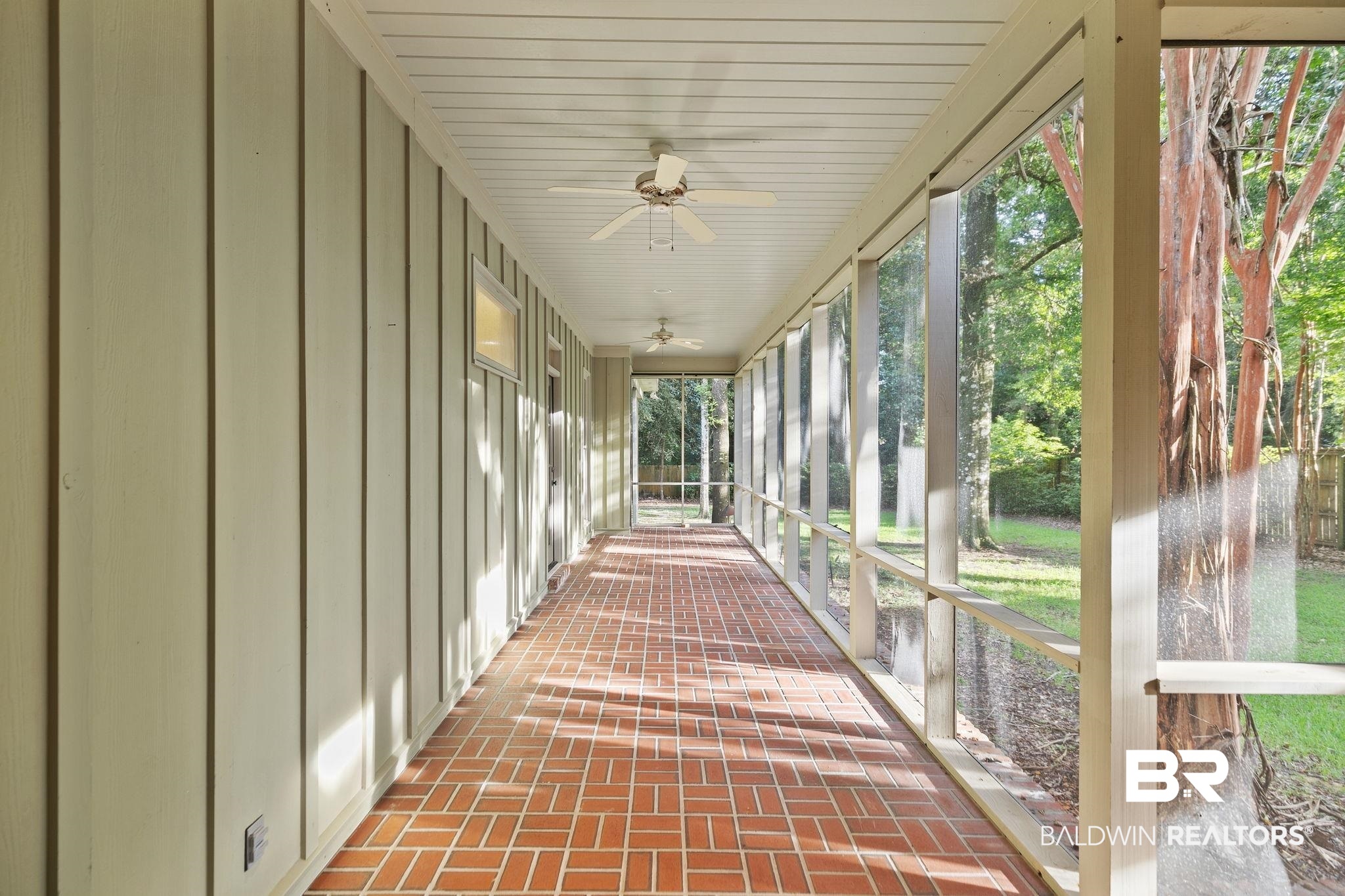 202 Beall Lane Daphne, AL 36526 - Photo 33 of 46 Unfurnished sunroom featuring a wealth of natural light and ceiling fan