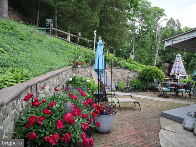 a garden view with a seating space