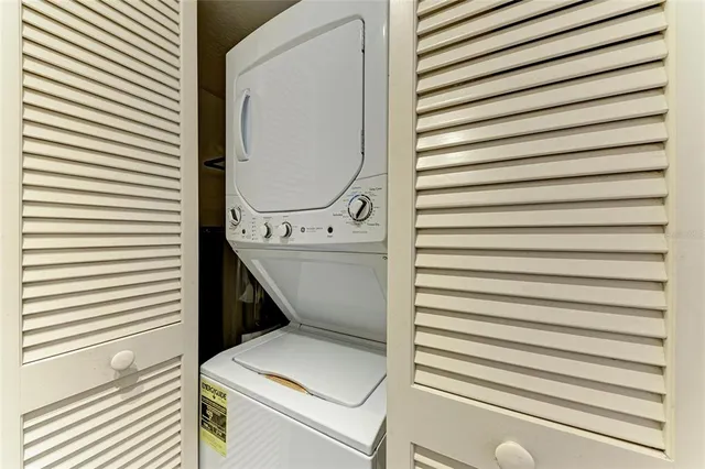 a sitting area with furniture and a window