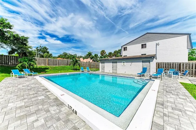 a view of a lake with a yard