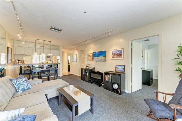 a living room with furniture and a table