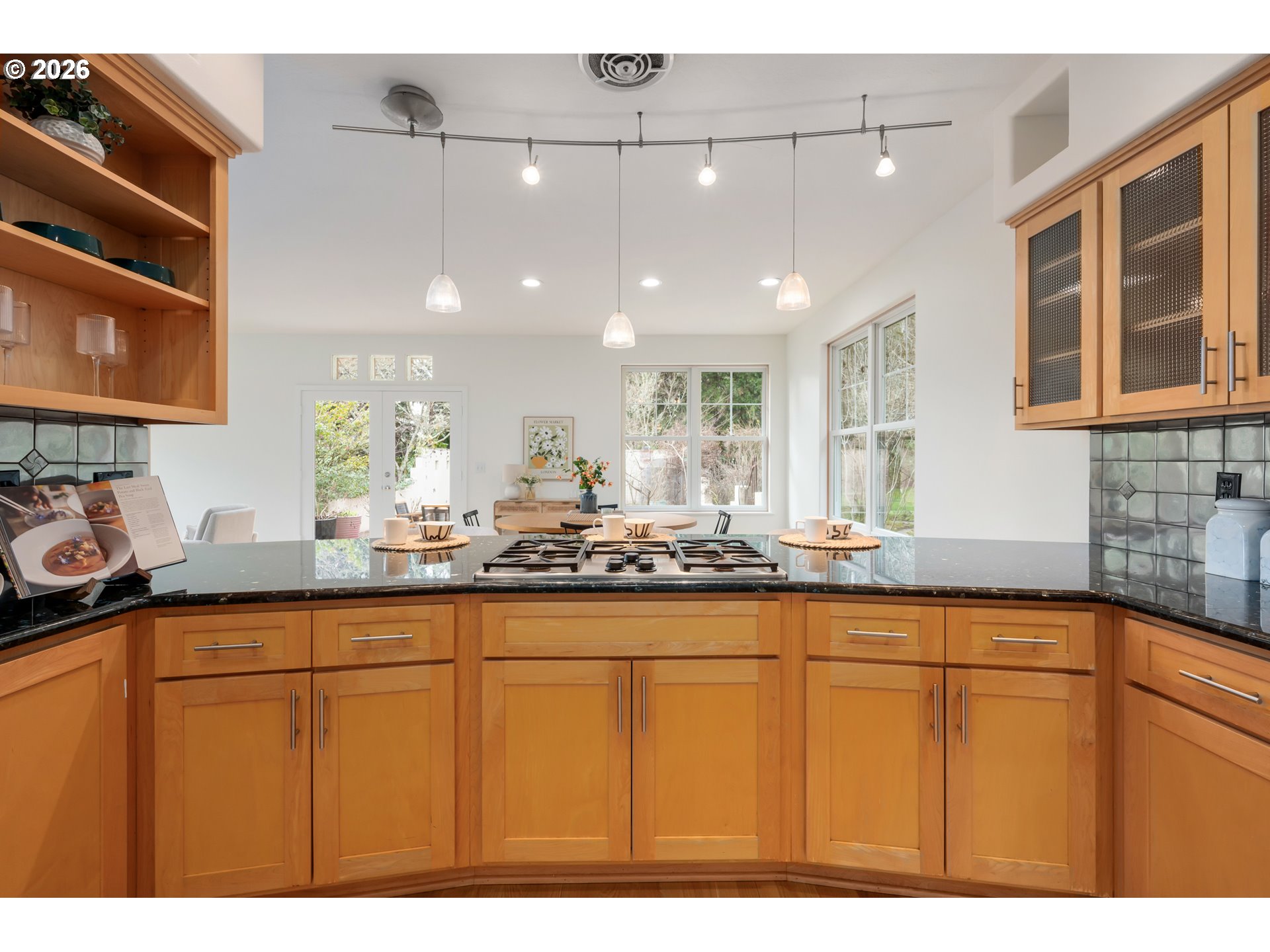 4015 Spring Knoll Drive Eugene, OR 97405 - Photo 12 of 48 a kitchen with stainless steel appliances granite countertop a sink and cabinets