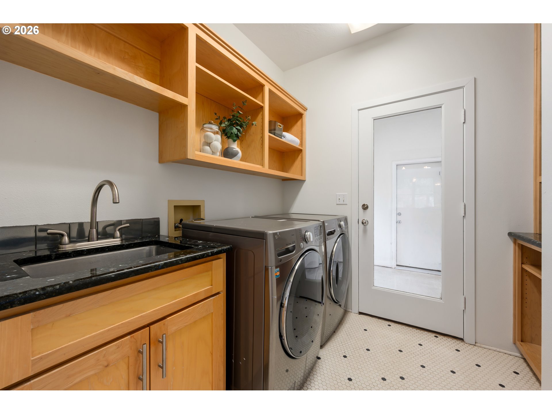 4015 Spring Knoll Drive Eugene, OR 97405 - Photo 14 of 48 a utility room with dryer and washer