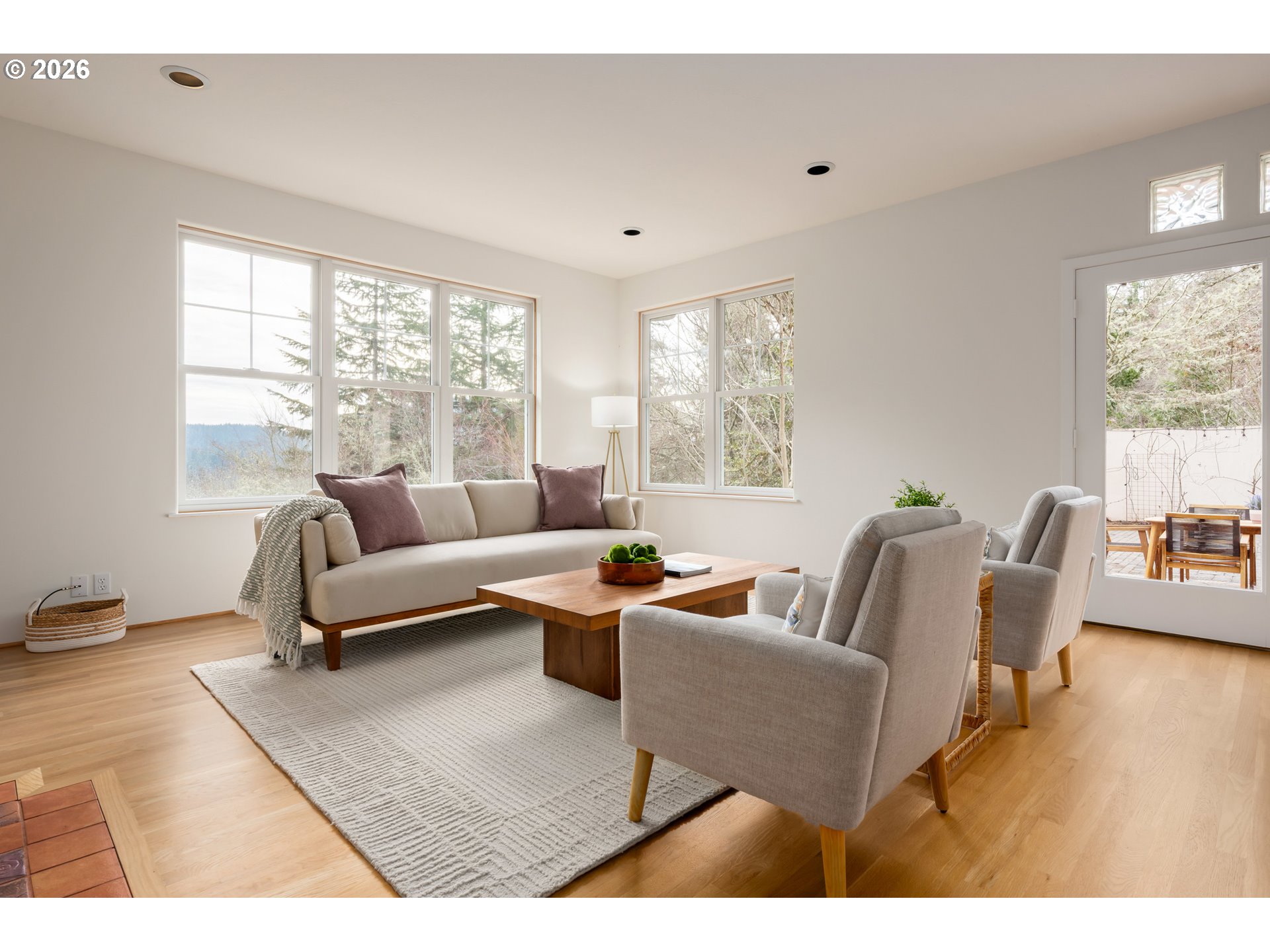 4015 Spring Knoll Drive Eugene, OR 97405 - Photo 15 of 48 a living room with furniture and a large window