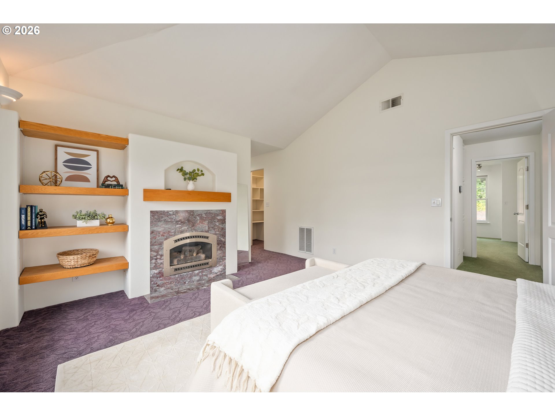 4015 Spring Knoll Drive Eugene, OR 97405 - Photo 24 of 48 a bedroom with a bed and a fireplace