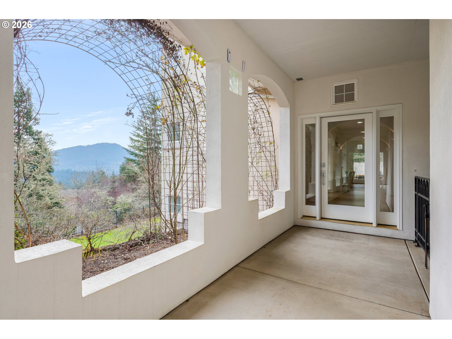 4015 Spring Knoll Drive Eugene, OR 97405 - Photo 3 of 48 a view of an entryway with wooden floor