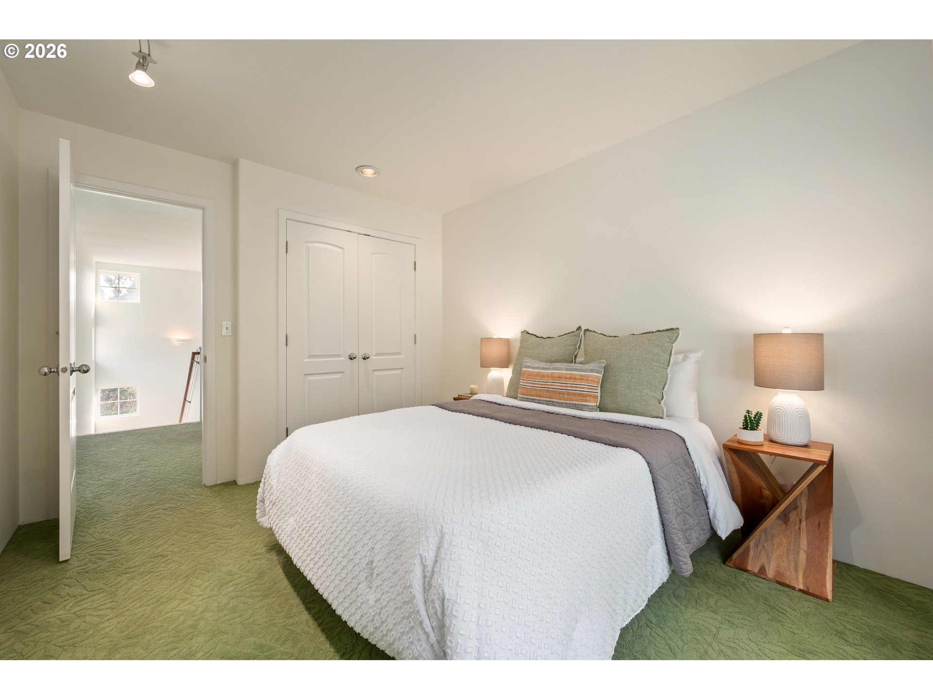 4015 Spring Knoll Drive Eugene, OR 97405 - Photo 32 of 48 a bedroom with a bed and a table