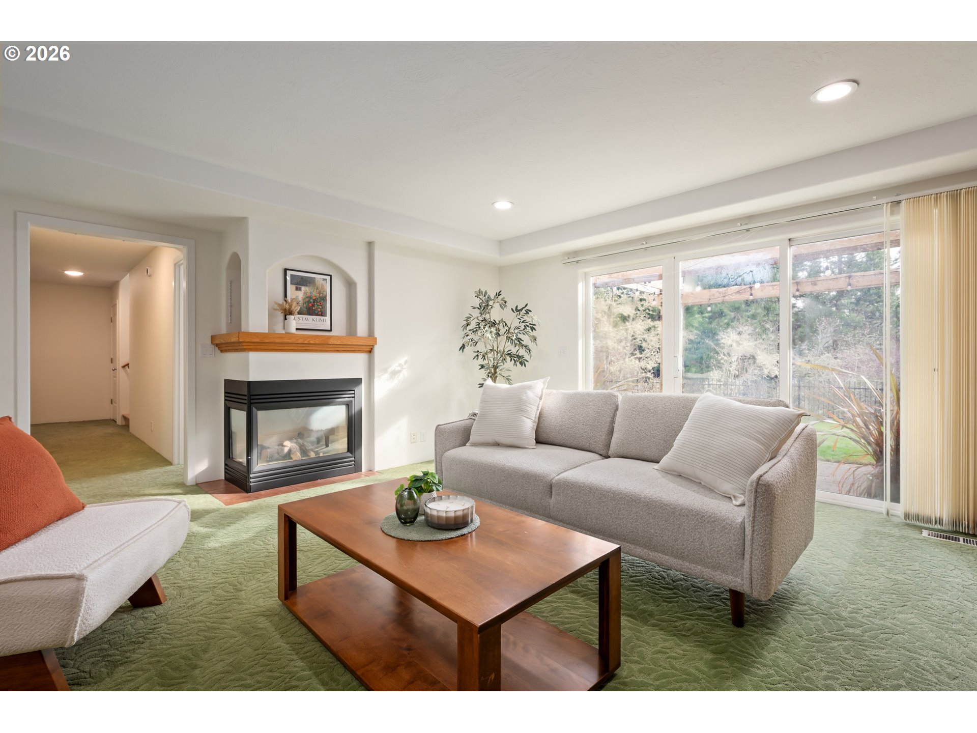 4015 Spring Knoll Drive Eugene, OR 97405 - Photo 36 of 48 a living room with furniture and a fireplace