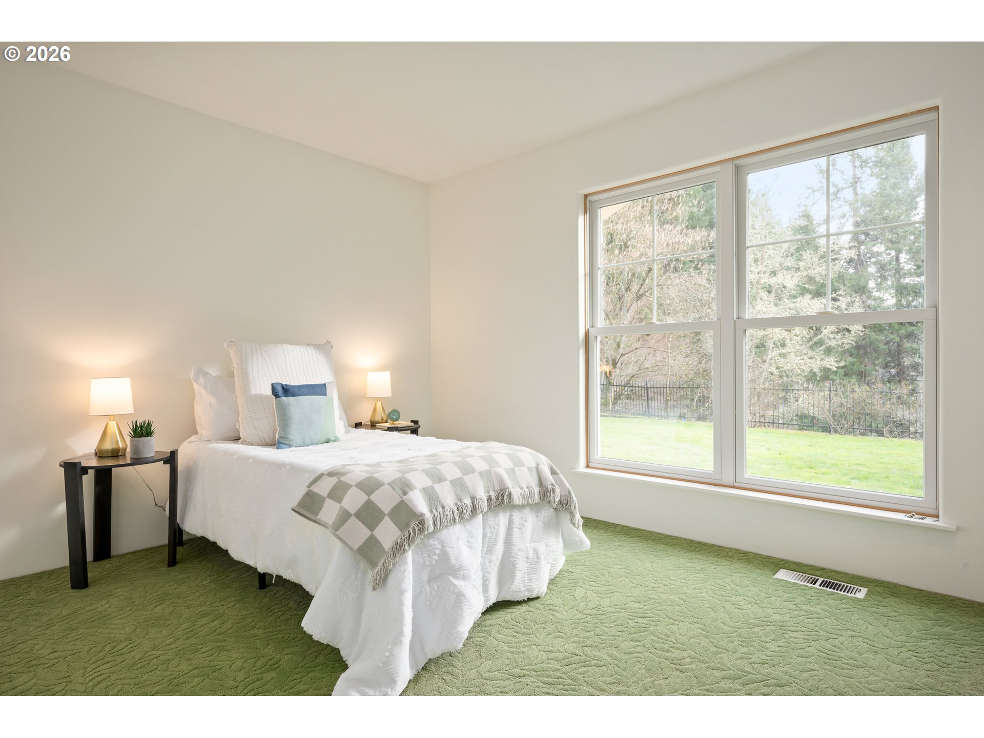 4015 Spring Knoll Drive Eugene, OR 97405 - Photo 37 of 48 a bed room with a bed and a large window