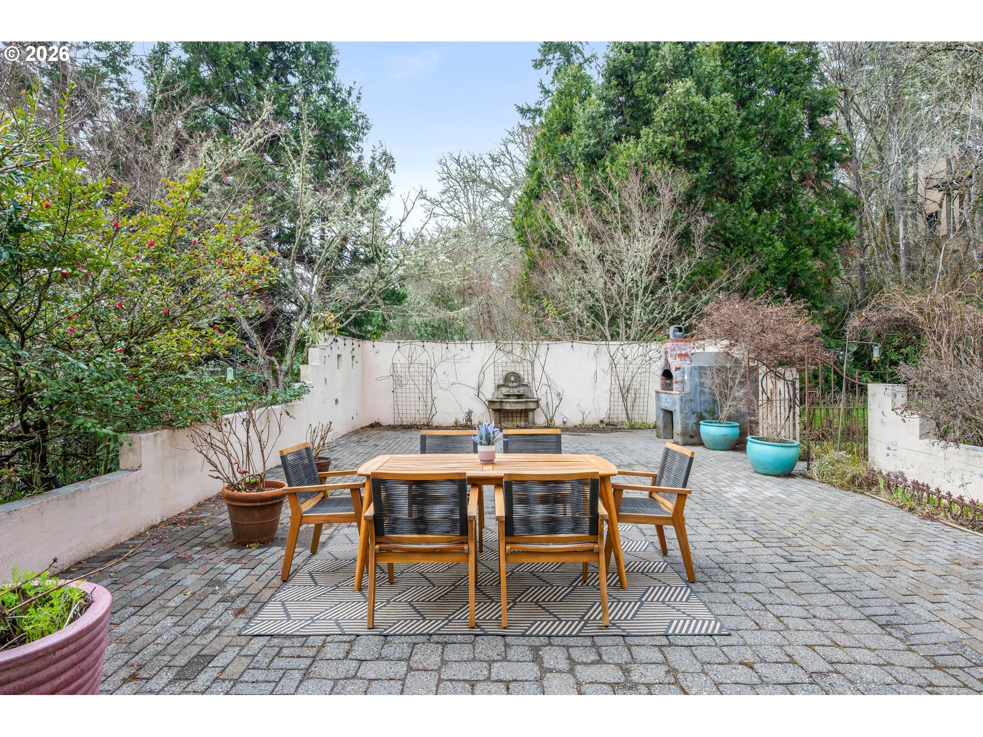 4015 Spring Knoll Drive Eugene, OR 97405 - Photo 39 of 48 a view of a table and chairs in patio