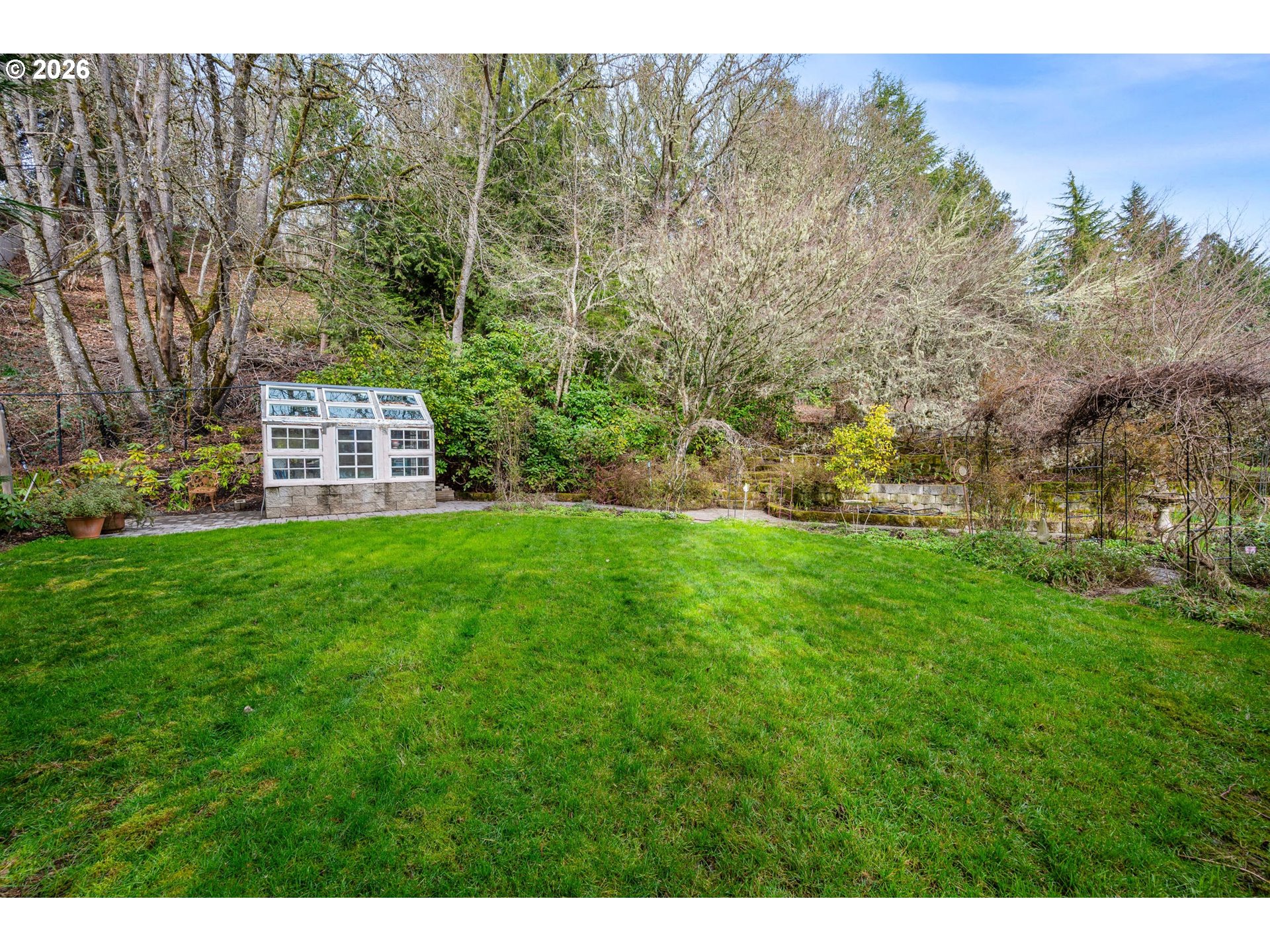 4015 Spring Knoll Drive Eugene, OR 97405 - Photo 42 of 48 a backyard of a house with lots of green space