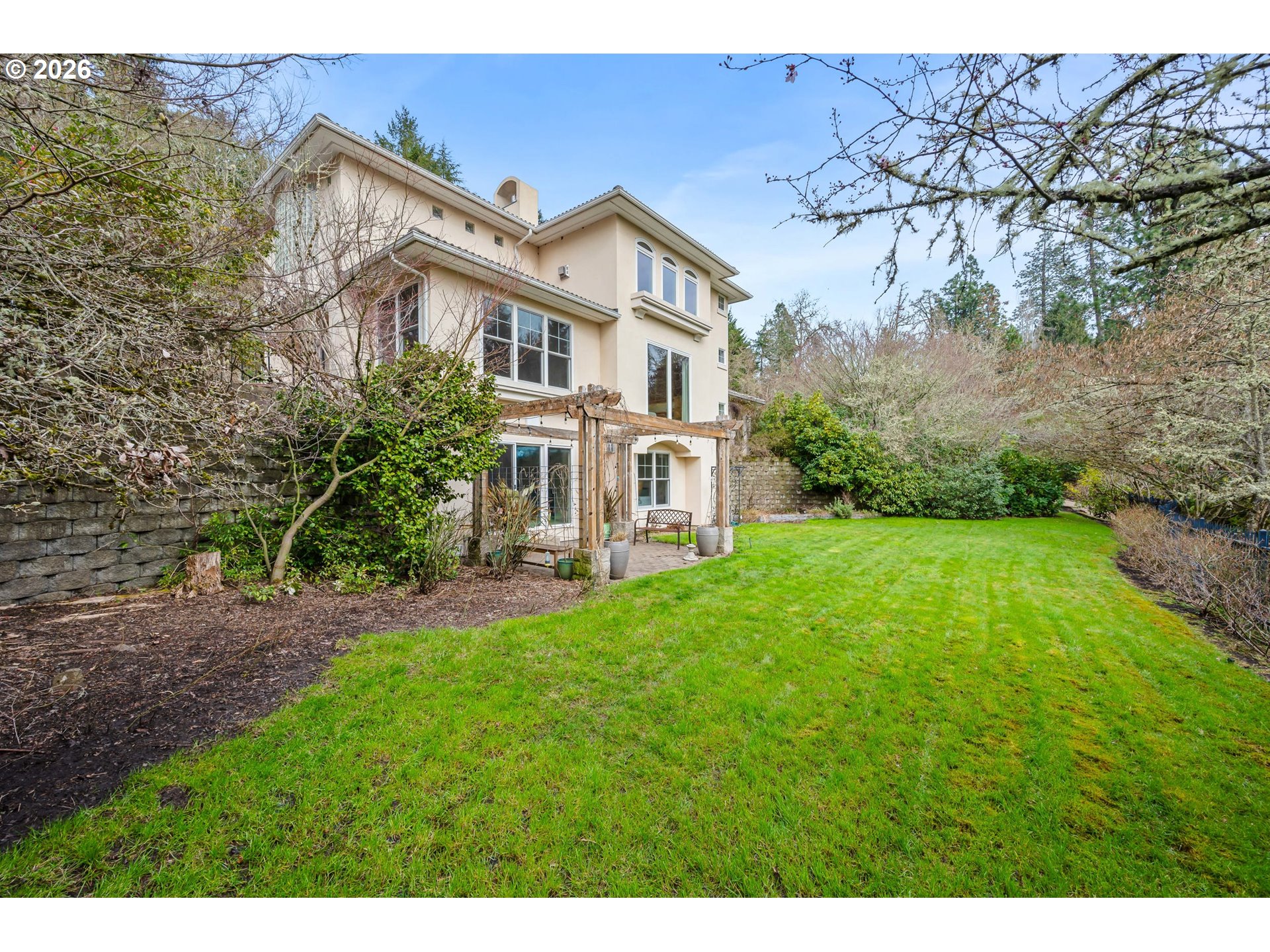 4015 Spring Knoll Drive Eugene, OR 97405 - Photo 44 of 48 a front view of a house with yard and green space