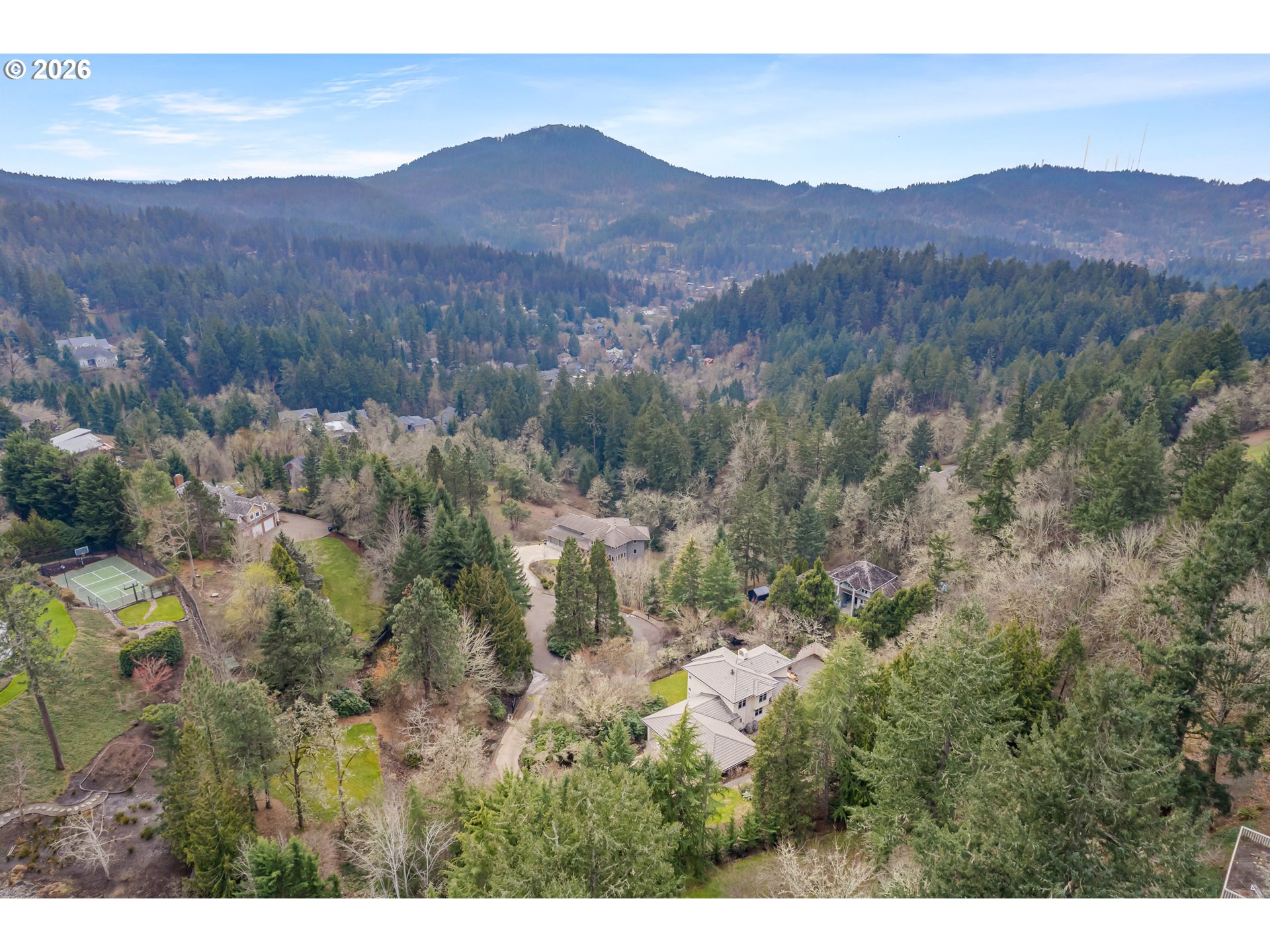 4015 Spring Knoll Drive Eugene, OR 97405 - Photo 45 of 48 a view of a lush green hillside and a building