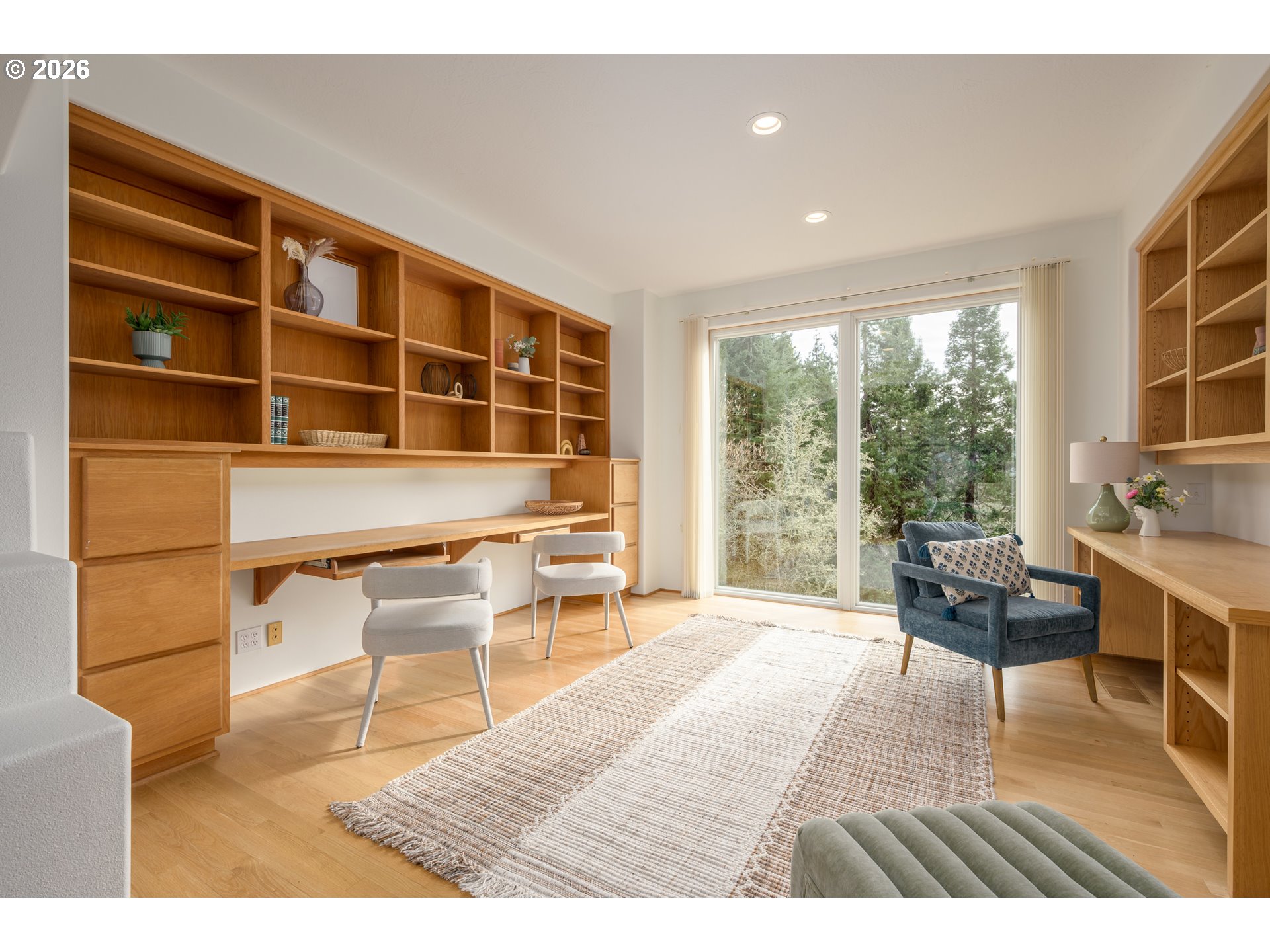 4015 Spring Knoll Drive Eugene, OR 97405 - Photo 6 of 48 a living room with furniture and a floor to ceiling window