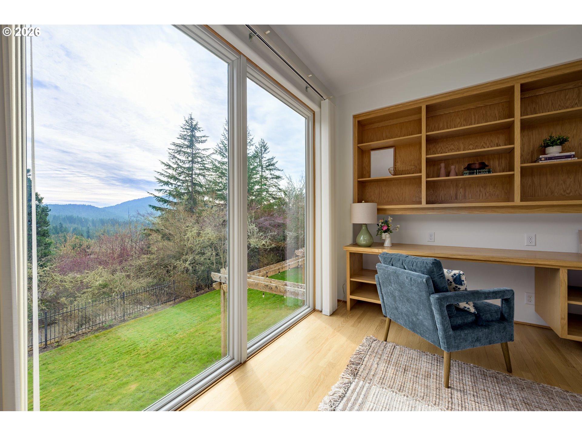 4015 Spring Knoll Drive Eugene, OR 97405 - Photo 7 of 48 a living room filled with furniture and a floor to ceiling window