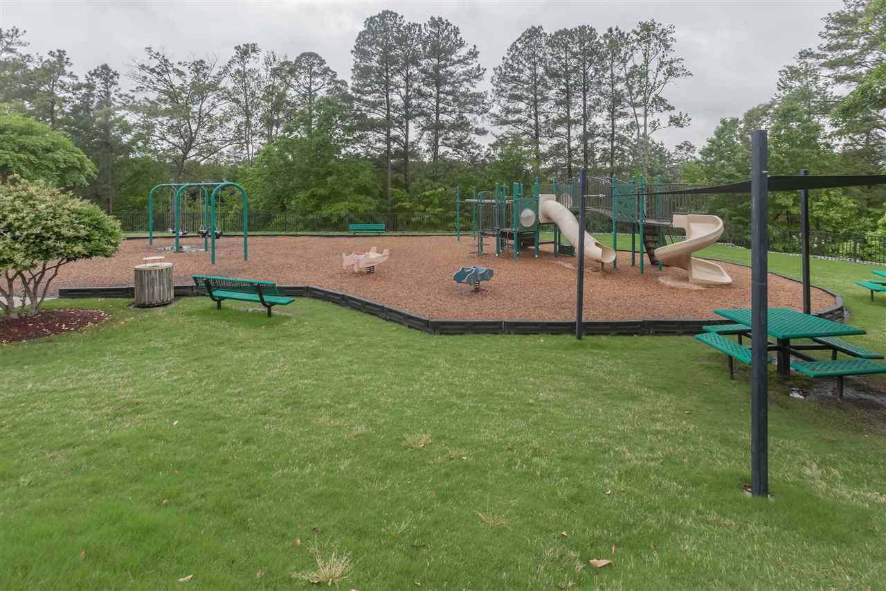 7613 Silver View Lane Raleigh, NC 27613 - Photo 24 of 25 The Long Lake playground is right next to the pool, tennis, and clubhouse. Play Structure
