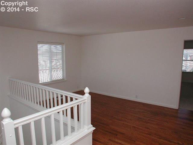4011 Diamond Ridge View Colorado Springs, CO 80918 - Photo 12 of 17 15x17 Loft with Hardwood Flooring and Pikes Peak & Mountain Views!
