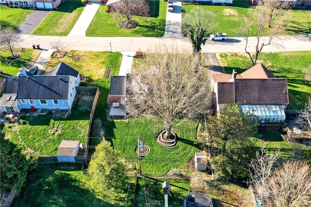 1237 Laurelwood Road Dayton, OH 45409 - Photo 51 of 56 This expansive lot features mature trees and ample green space, ideal for outdoor activities.