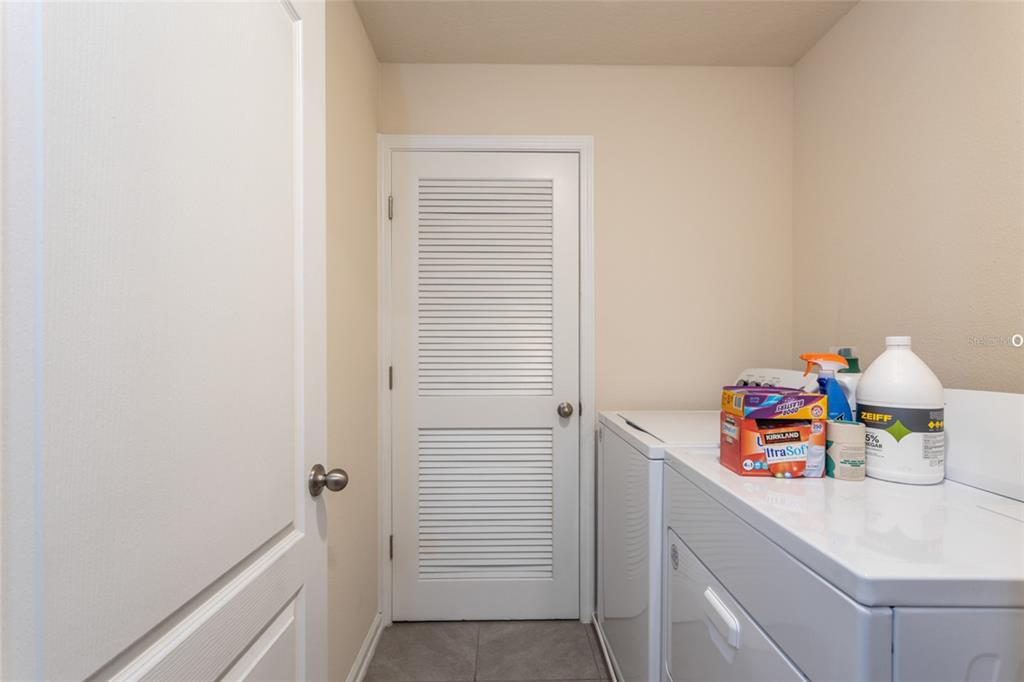 71 Redbud Road Palm Coast, FL 32137 - Photo 21 of 32 a storage room with a window