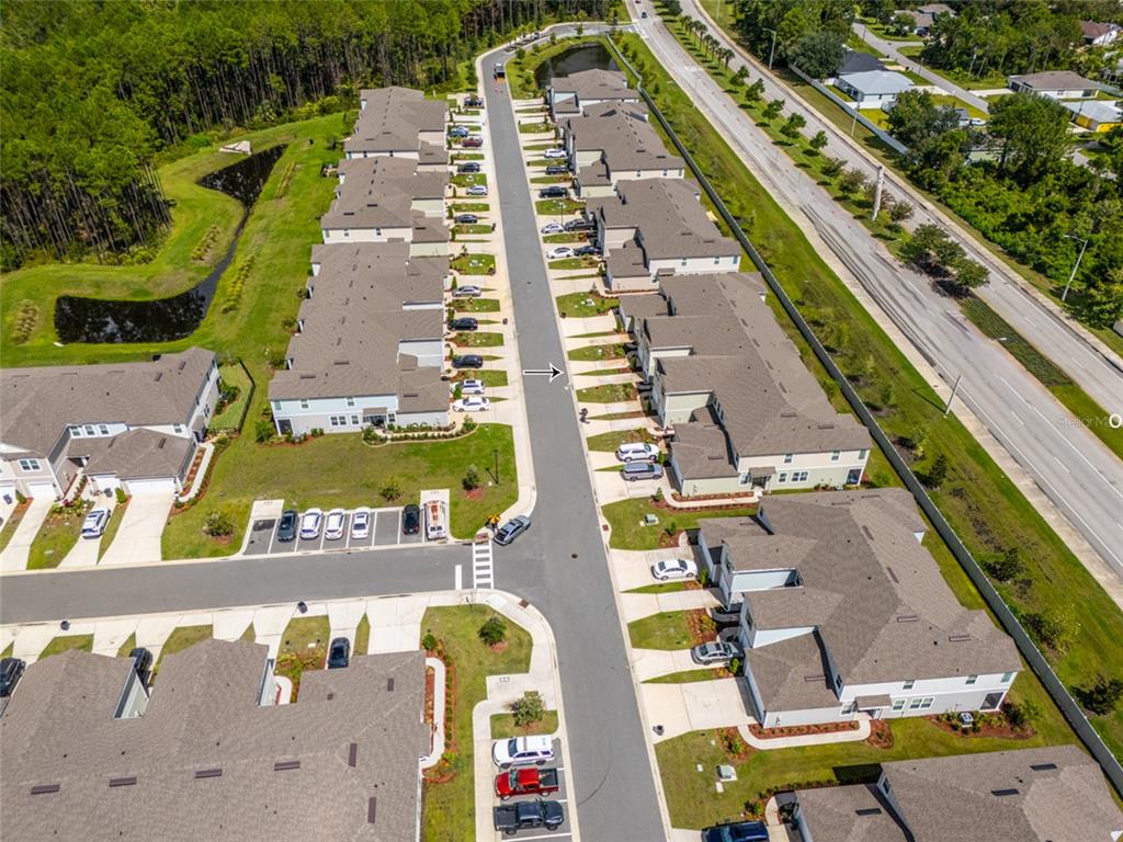 71 Redbud Road Palm Coast, FL 32137 - Photo 25 of 32 an aerial view of swimming pool
