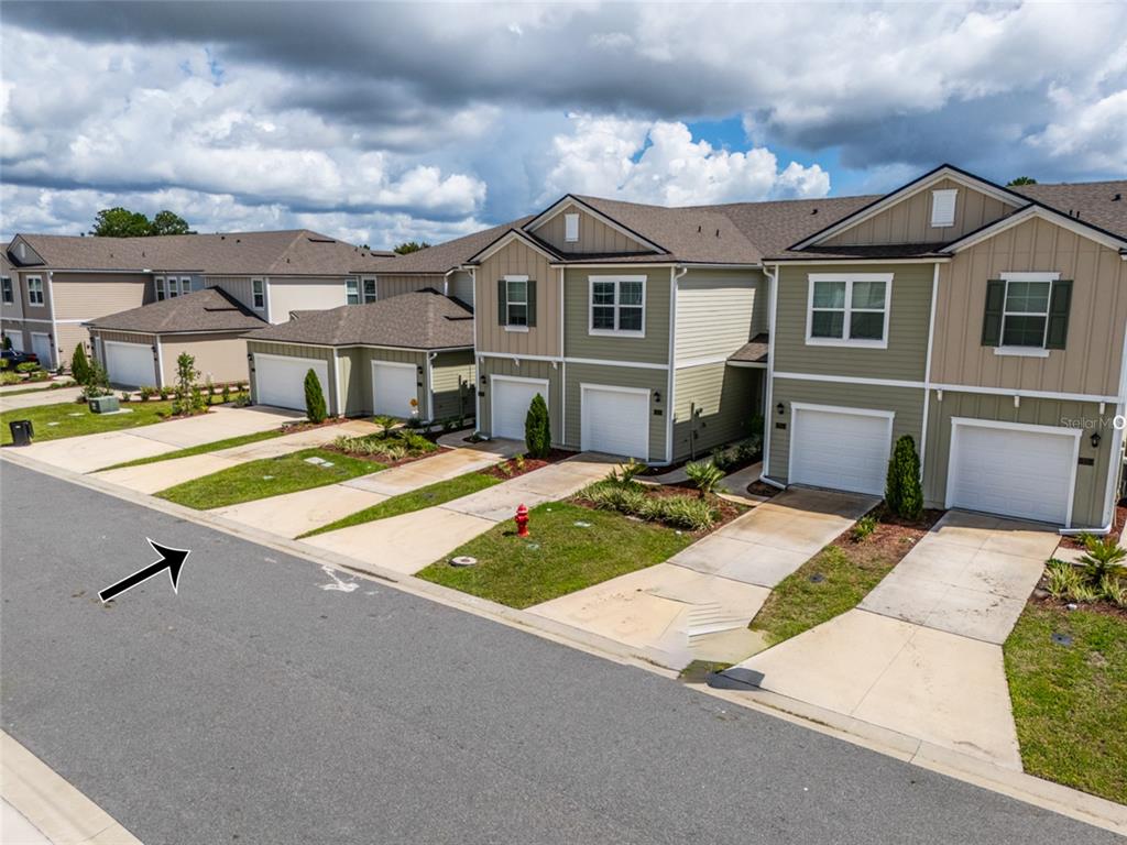 71 Redbud Road Palm Coast, FL 32137 - Photo 31 of 32 a aerial view of a house with entertaining space