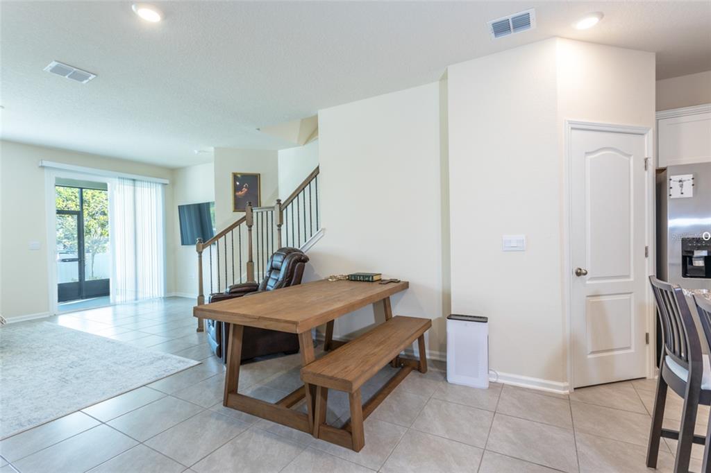 71 Redbud Road Palm Coast, FL 32137 - Photo 9 of 32 a bedroom with furniture and a window