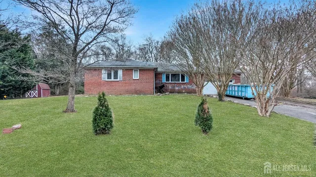 a house view with a garden space