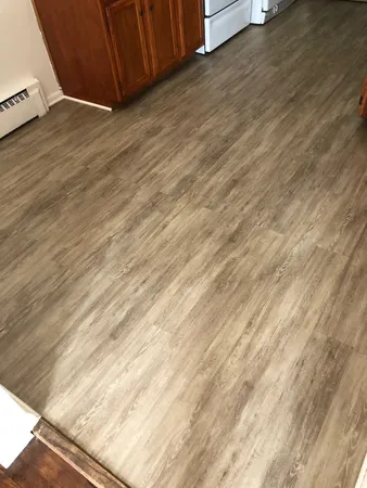 a view of wooden floor and a sink