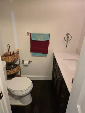 a bathroom with a toilet and a sink