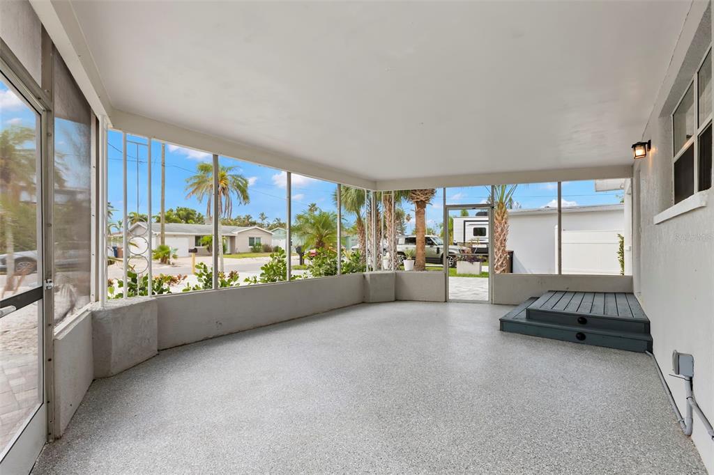 708 Sunset Cove Madeira Beach, FL 33708 - Photo 39 of 61 a room with natural light and furniture