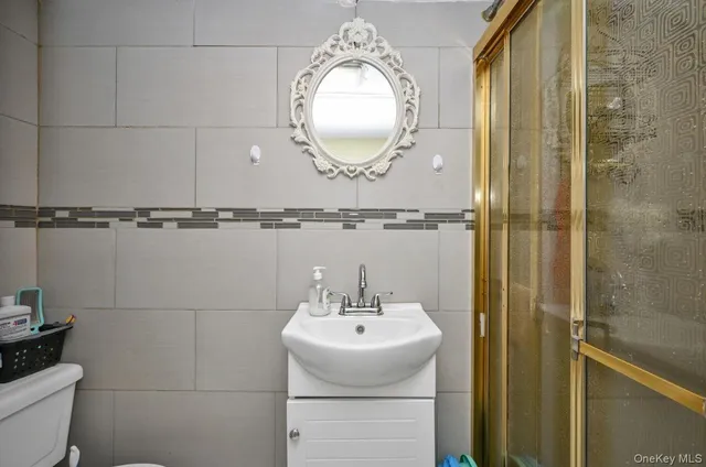 a bathroom with a sink and mirror
