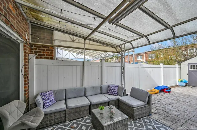 a view of a building with sitting area