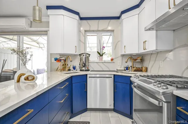 a kitchen with a sink a stove and cabinets