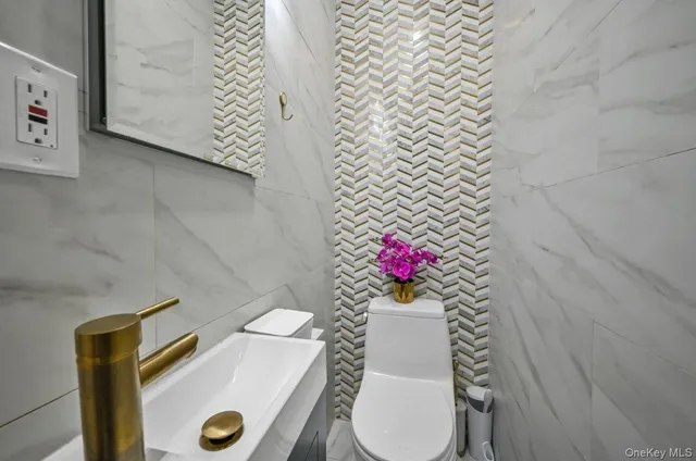 a bathroom with a sink and a toilet