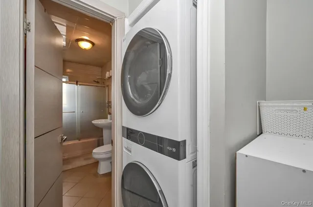 a view of a bathroom with a washer and dryer