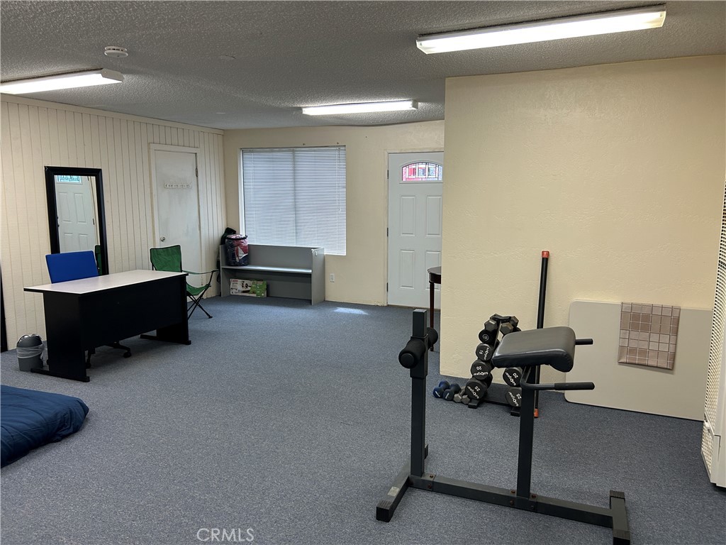7025 Cuddy Valley Road, Unit F & H Frazier Park, CA 93225 - Photo 11 of 14 a room with furniture and air conditioner
