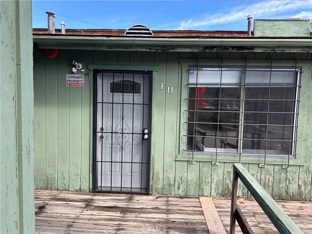7025 Cuddy Valley Road, Unit F & H Frazier Park, CA 93225 - Photo 12 of 14 a view of a entryway door of the house