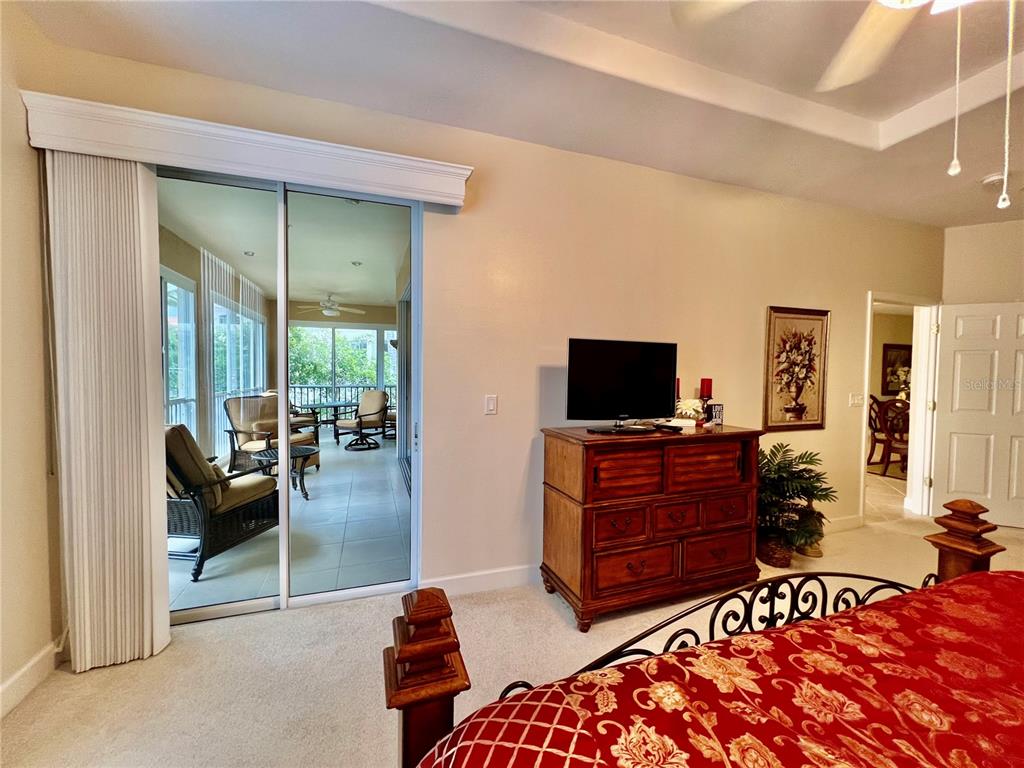 3304 Sunset Key Circle, Unit D Punta Gorda, FL 33955 - Photo 19 of 53 a living room with furniture and a flat screen tv