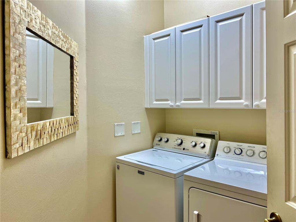 3304 Sunset Key Circle, Unit D Punta Gorda, FL 33955 - Photo 29 of 53 a utility room with dryer and washer