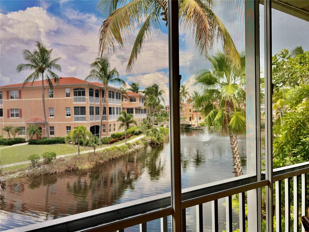 3304 Sunset Key Circle, Unit D Punta Gorda, FL 33955 - Photo 5 of 53 a view of a building from a window