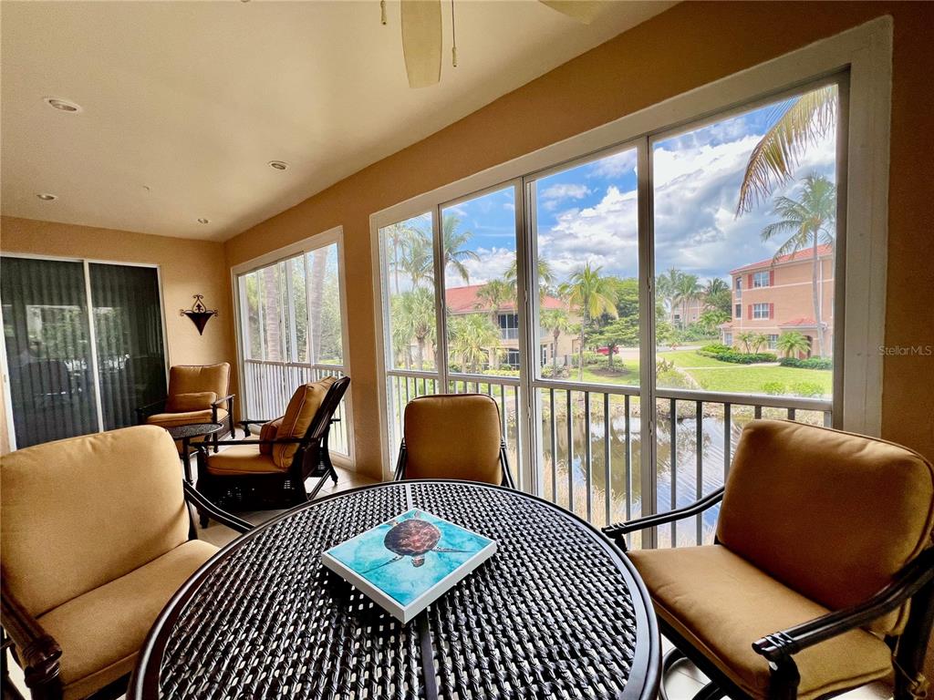 3304 Sunset Key Circle, Unit D Punta Gorda, FL 33955 - Photo 6 of 53 a living room with furniture and a large window