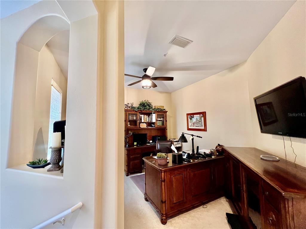 3304 Sunset Key Circle, Unit D Punta Gorda, FL 33955 - Photo 7 of 53 a living room with furniture and a flat screen tv