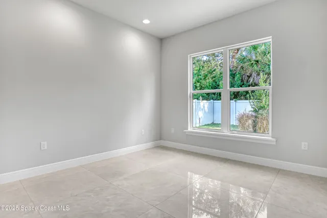 an empty room with windows