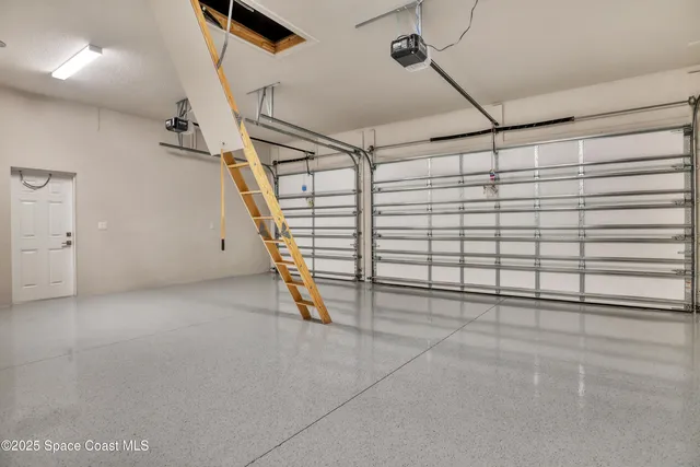 a view of a garage with stairs